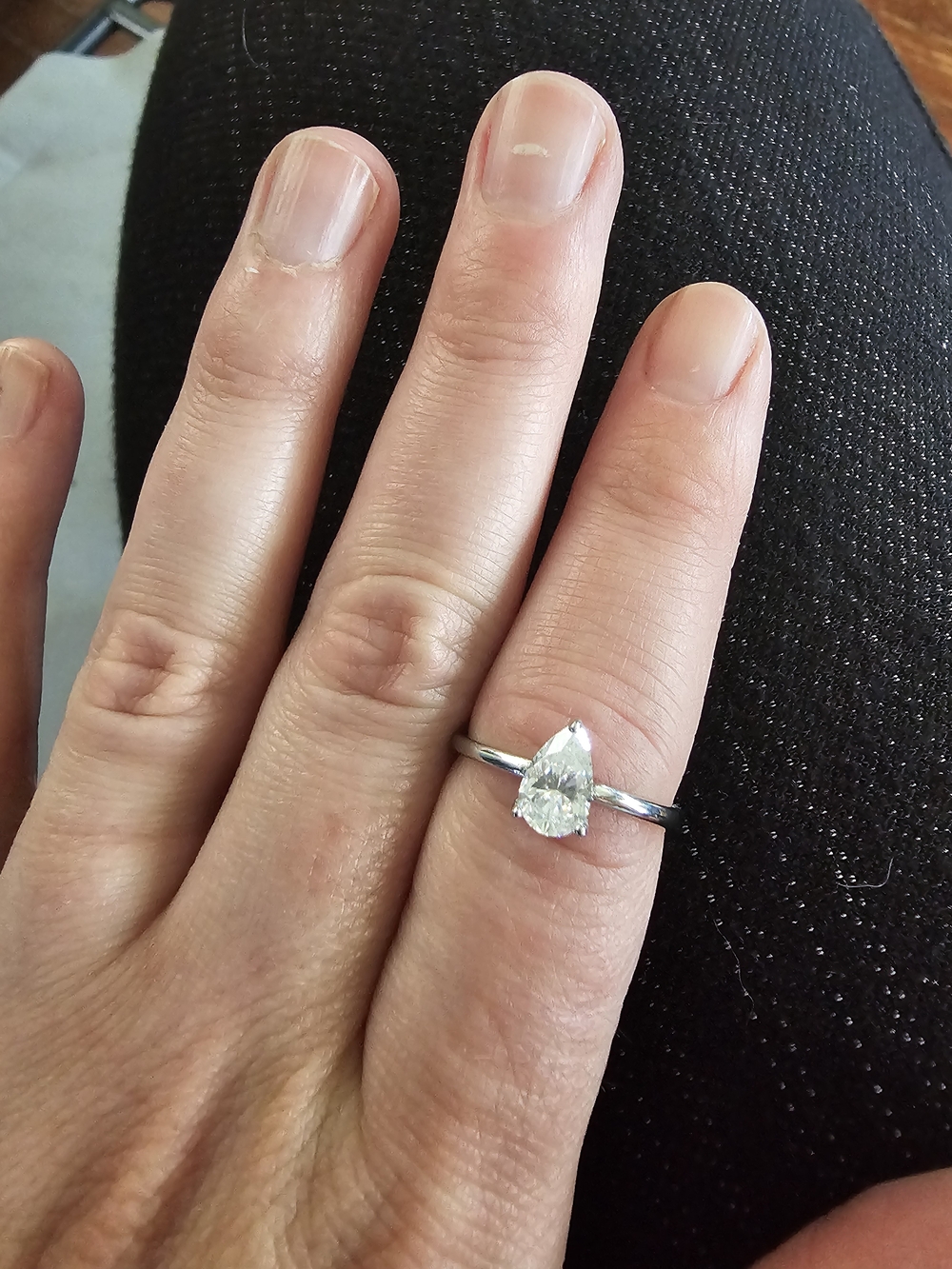 Sterling Silver Pear-Cut VVS1 Moissanite Adjustable Ring.